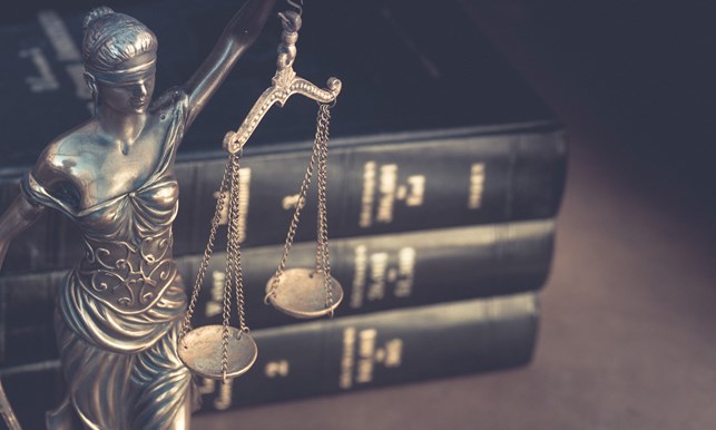 justice-statue-and-law-books